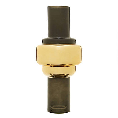 Decorative object with gold and black design on a white background