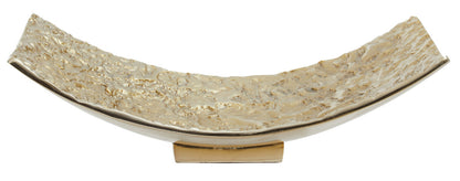 Decorative curved stone sculpture on a white background