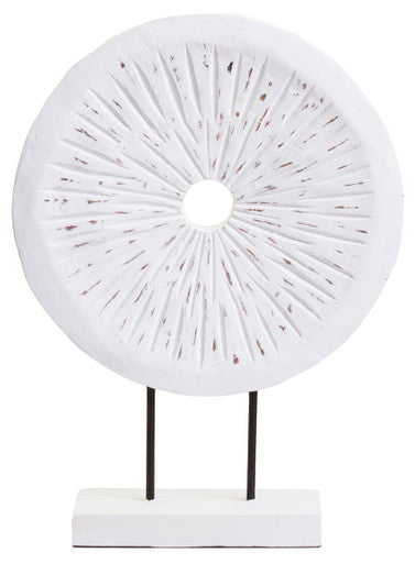Decorative white circular object on a stand with a plain background