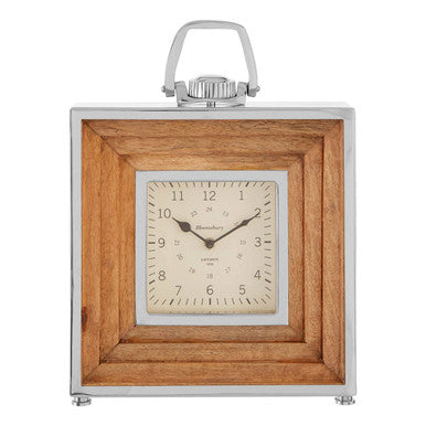 Table clock with wooden frame and silver accents on a white background