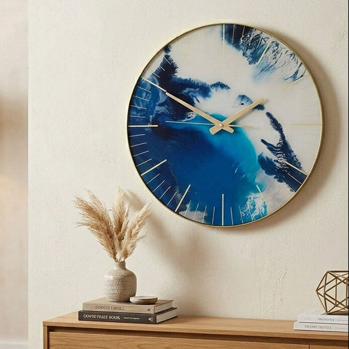 Living room with a large decorative clock on the wall, wooden coffee table, and blue sofa.