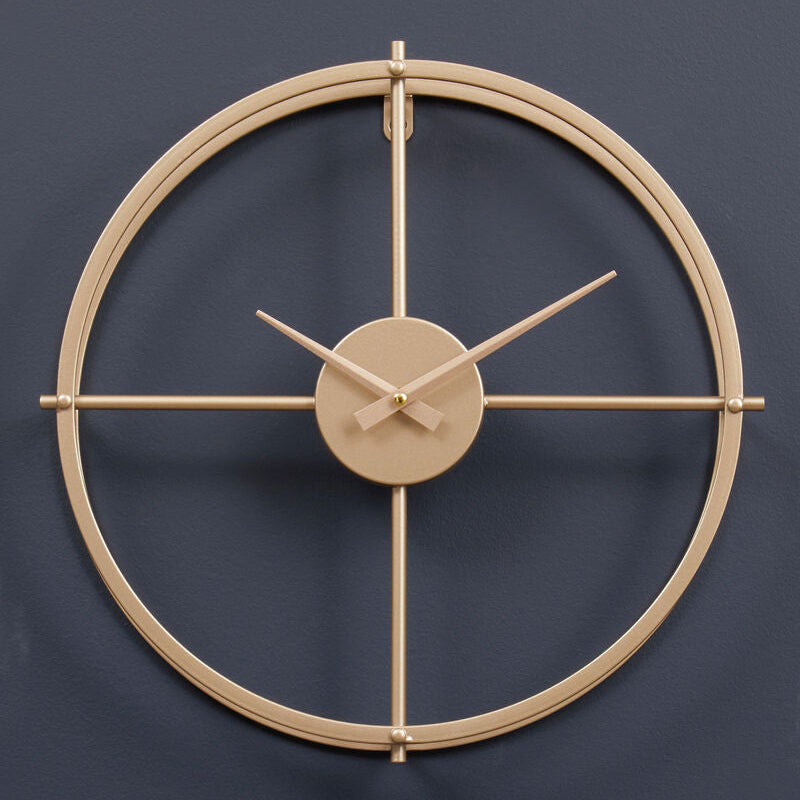 Gold wall clock on a dark blue background