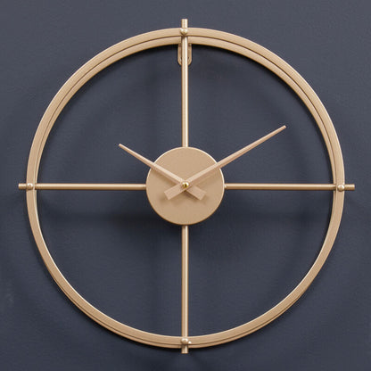Gold wall clock on a dark blue background