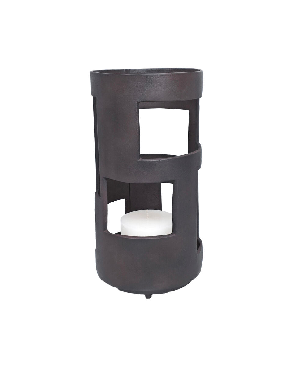 Black cylindrical lantern with a white candle inside on a white background