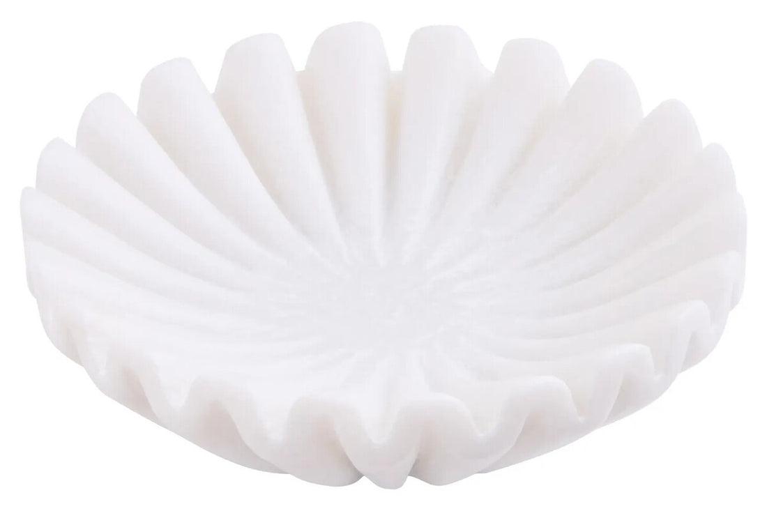 White ceramic bowl with a textured surface on a white background