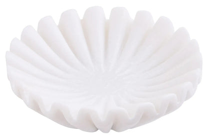 White ceramic bowl with a textured surface on a white background