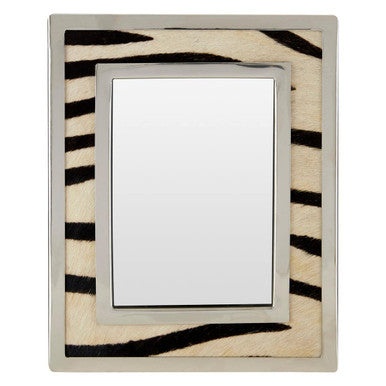 Decorative mirror with zebra print frame on a white background