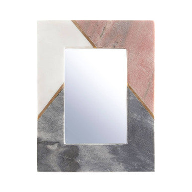 Rectangular mirror with a geometric pink and gray frame on a white background