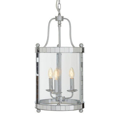 Decorative pendant light with clear glass shade and silver frame on a white background