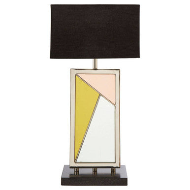 Table lamp with geometric design on the base against a white background