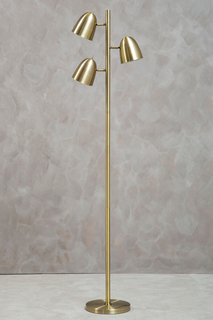 Gold floor lamp with three adjustable lights against a gray background