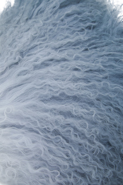 Close-up of textured white fabric with a wavy pattern