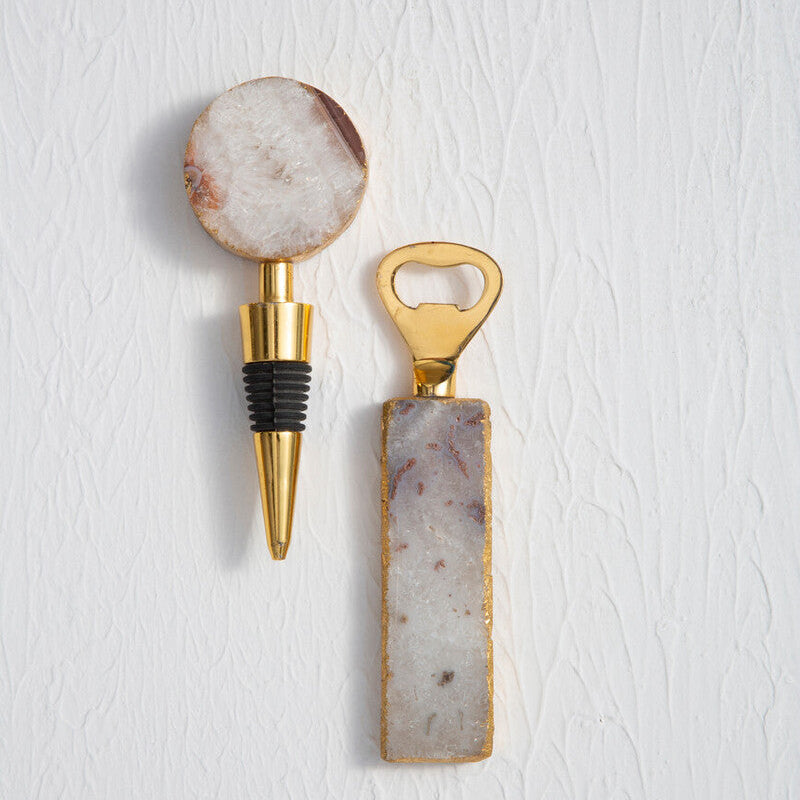 Bottle opener and cork screw with marble design on a white background
