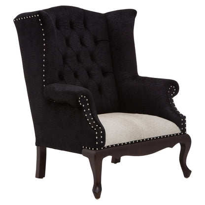 Black upholstered armchair with white cushion on a white background