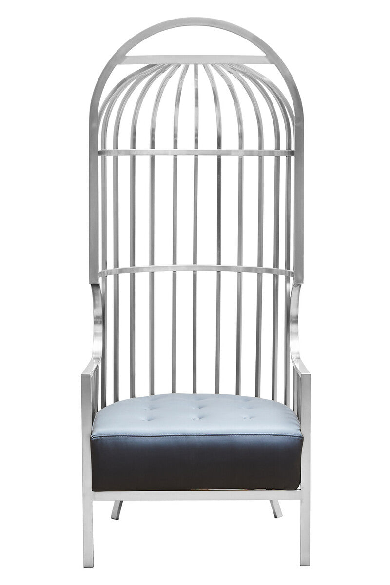 White birdcage-style chair with a black and white cushion on a white background