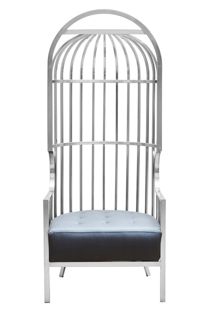 White birdcage-style chair with a black and white cushion on a white background