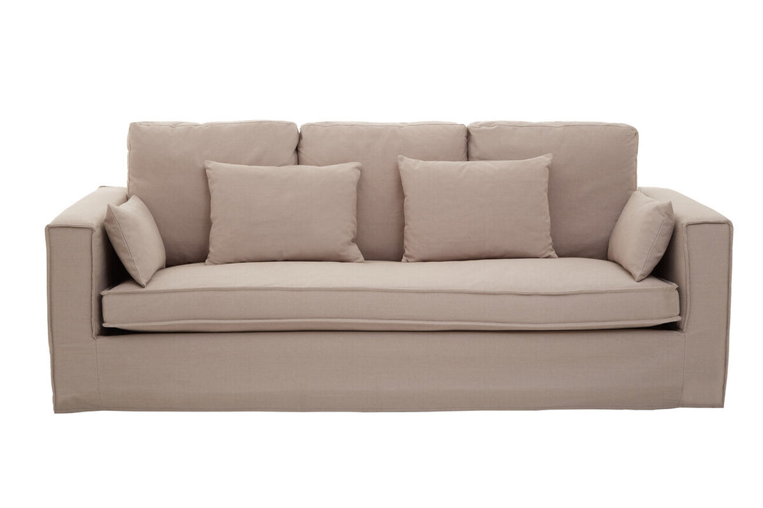 Beige sofa with cushions on a white background