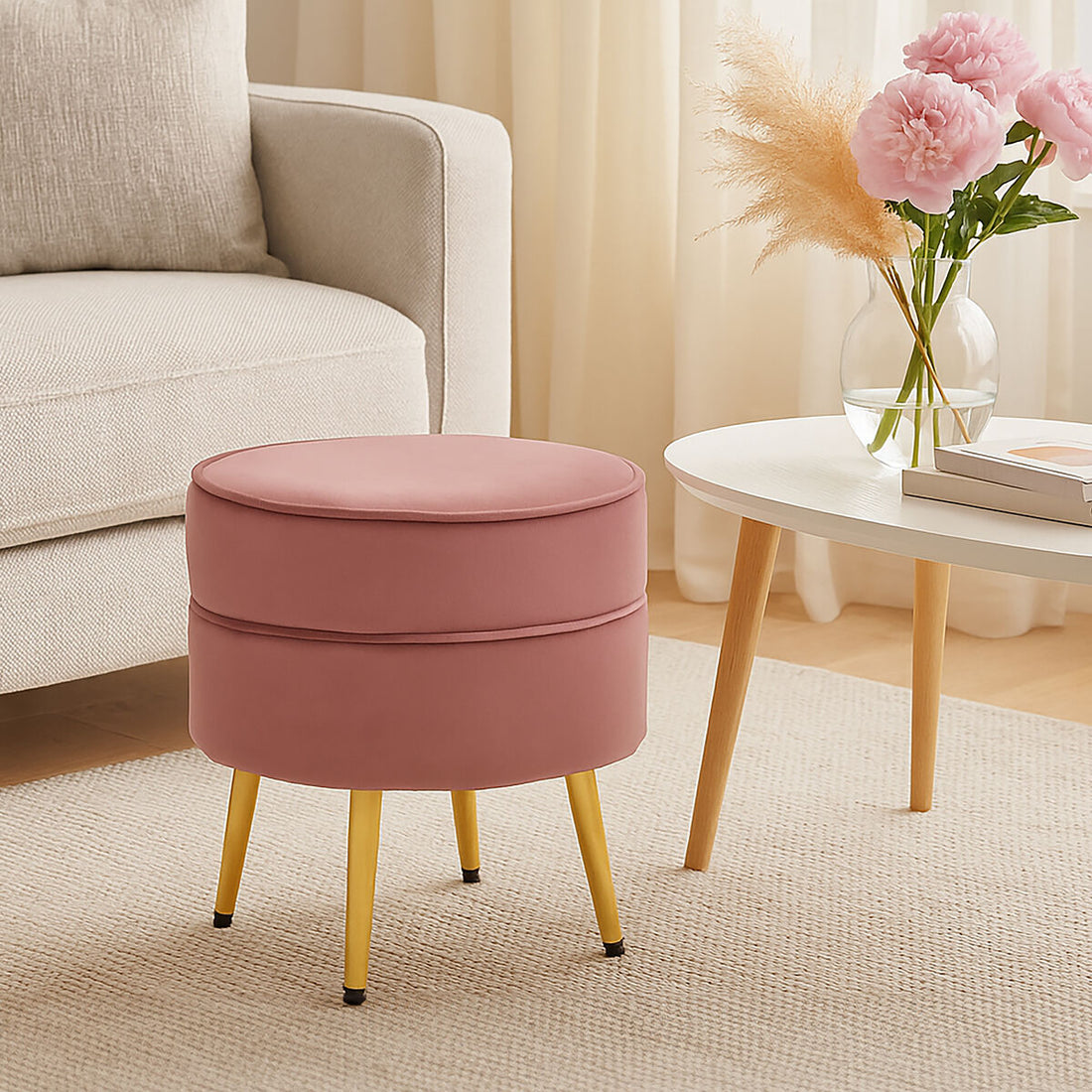 Pink ottoman with yellow legs in a living room setting