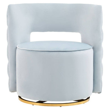 Light blue armchair with matching ottoman on a white background