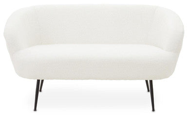 White upholstered bench with black legs on a white background