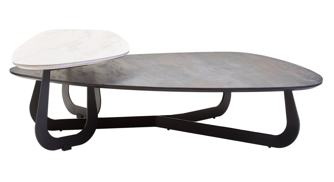 Modern coffee table with a concrete top and black metal base on a white background