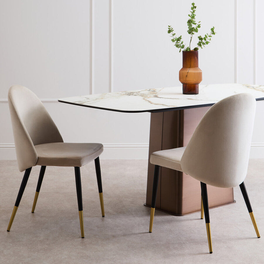 Dining table with two chairs in a minimalistic room