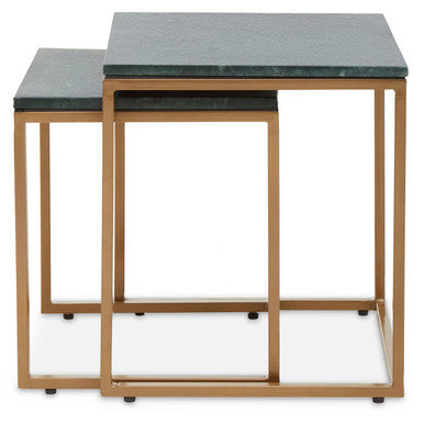 Set of two nesting tables with marble tops and gold frames on a white background