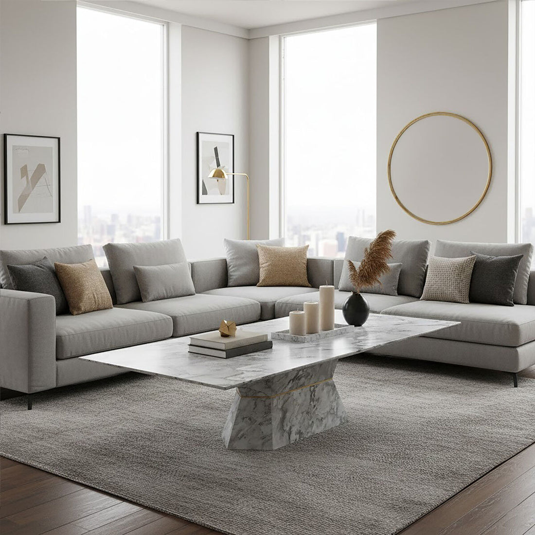 Modern living room with a gray sectional sofa, marble coffee table, and decorative elements.