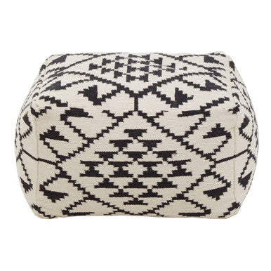 Black and white patterned cube-shaped pillow on a white background