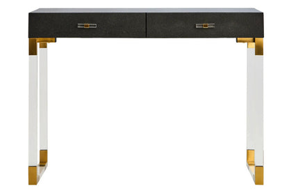 Modern console table with black top, gold accents, and white legs on a white background