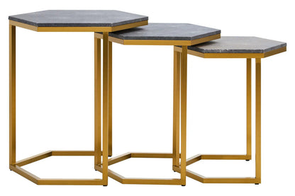 Set of three hexagonal side tables with gold frames and black marble tops on a white background