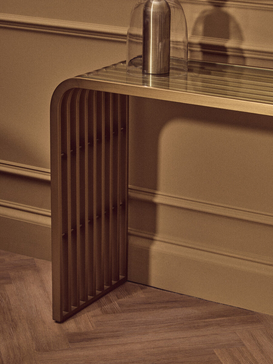 Matte Gold Slatted Console Table with Clear Glass Top, Vogue