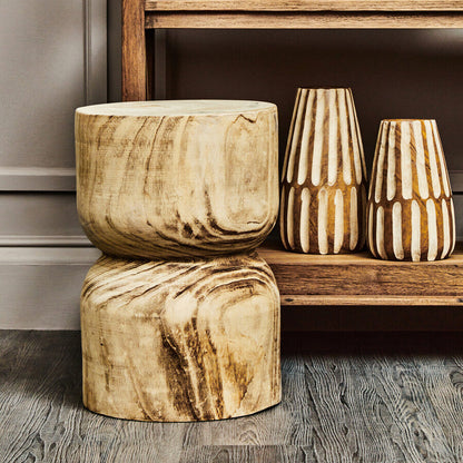 Wooden planters and vases on a wooden shelf against a gray wall.