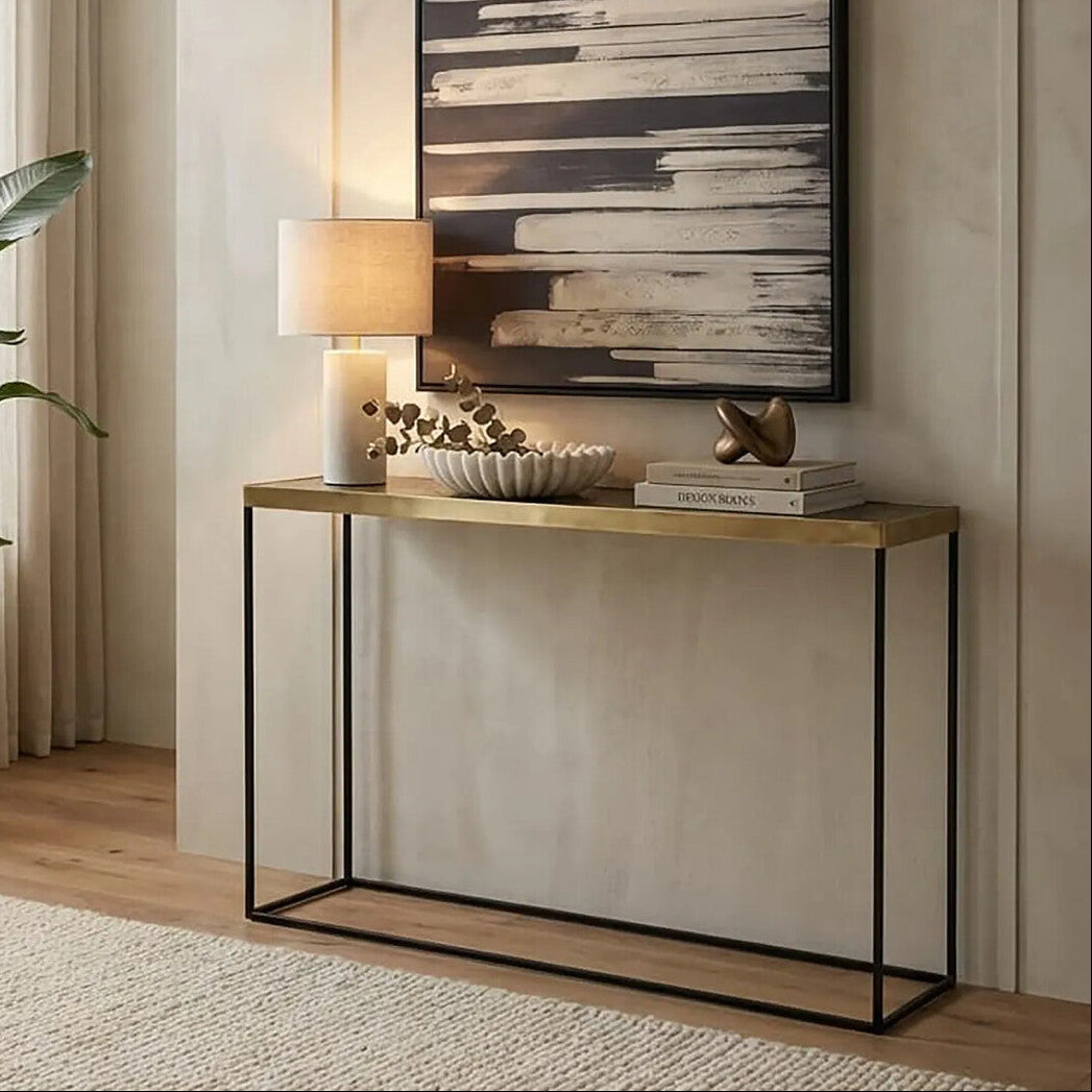 Console table with decorative items in a living room setting