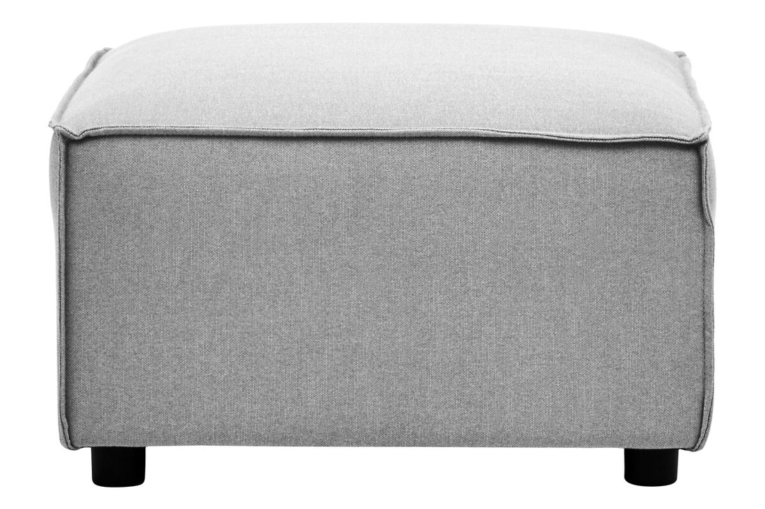 Gray ottoman with a white cushion on a white background