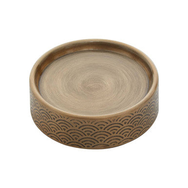 Ceramic bowl with wave pattern on a white background