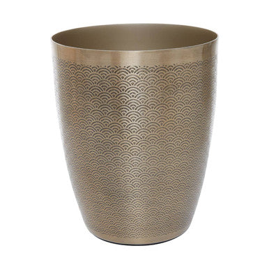 Bronze-colored metal trash can with wave pattern on a white background
