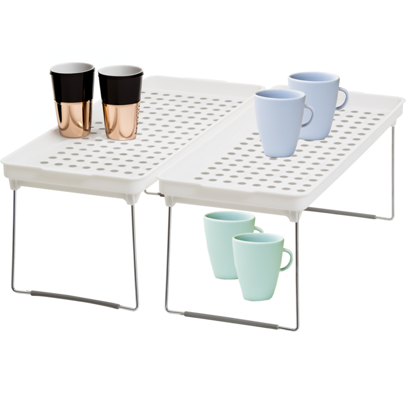 White metal table with perforated top holding colorful cups on a white background