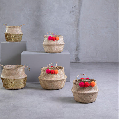 Set of woven baskets with decorative items on a gray background